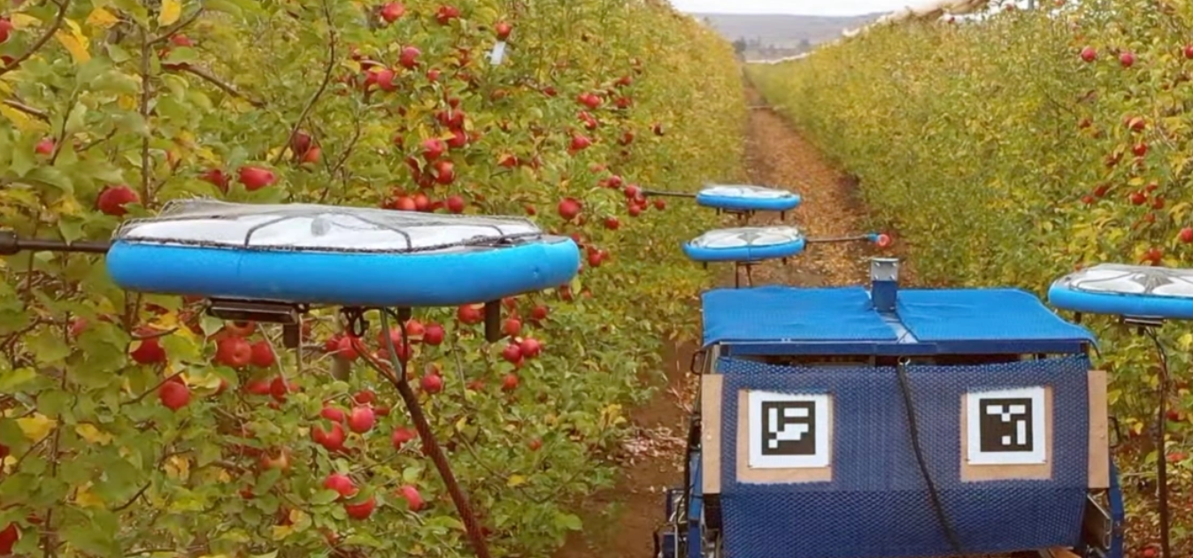 An inspection and sprayer drone patrolling a field.