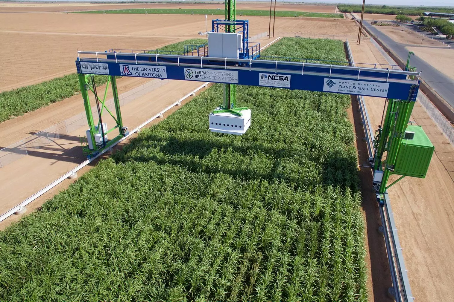 A multi-purpose gantry robot and the experimental maize plot it's caring for.